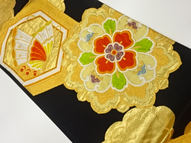 華紋・亀甲に蝶模様織出し袋帯